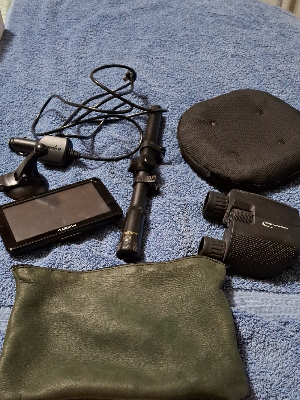 Garmin GPS Navigator, Scope, Binoculors with Black Accessories and Green Pouch